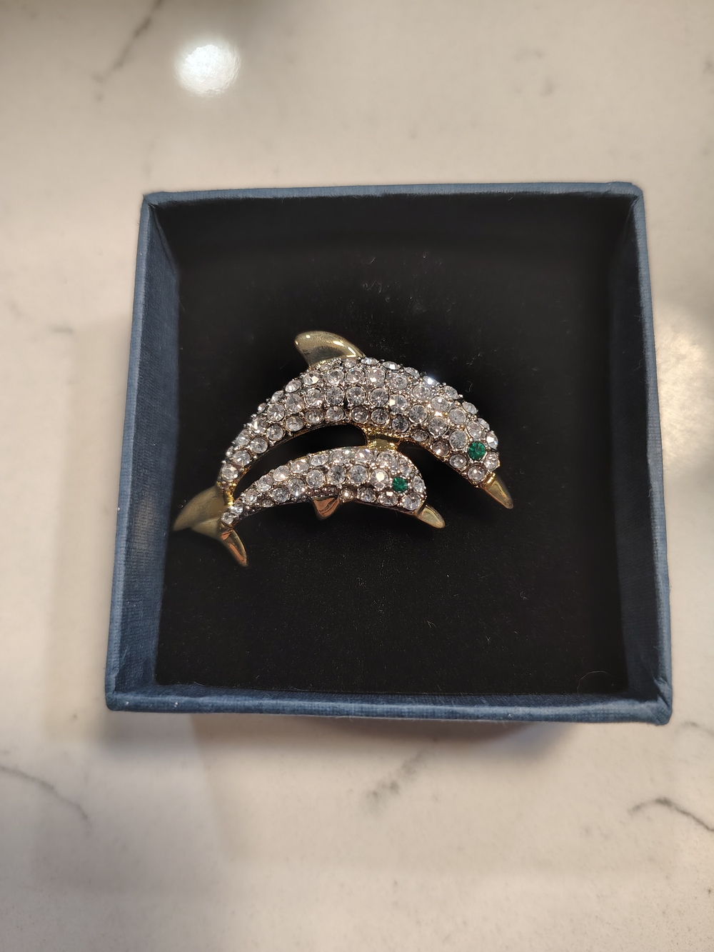 Gold-Tone Dolphin Crystal Brooch with Emerald Accents